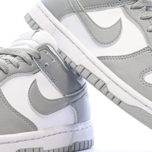 Dunk Low Baskets Blanches/Grises Femme Nike vue 7