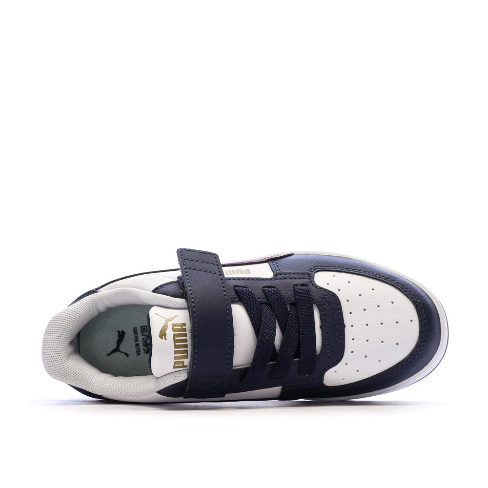 Zapatillas blancas y azul marino para niño de Puma Caven ver 4